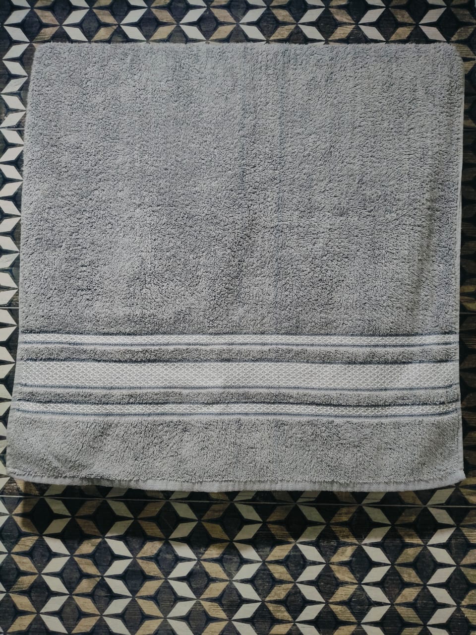 Grey Towel with Blue and White Stripes